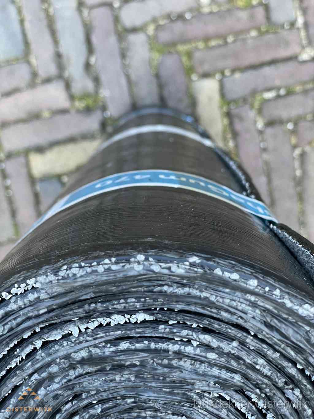 Rol bitumen dakleer met leislag voor plat dak in Oisterwijk